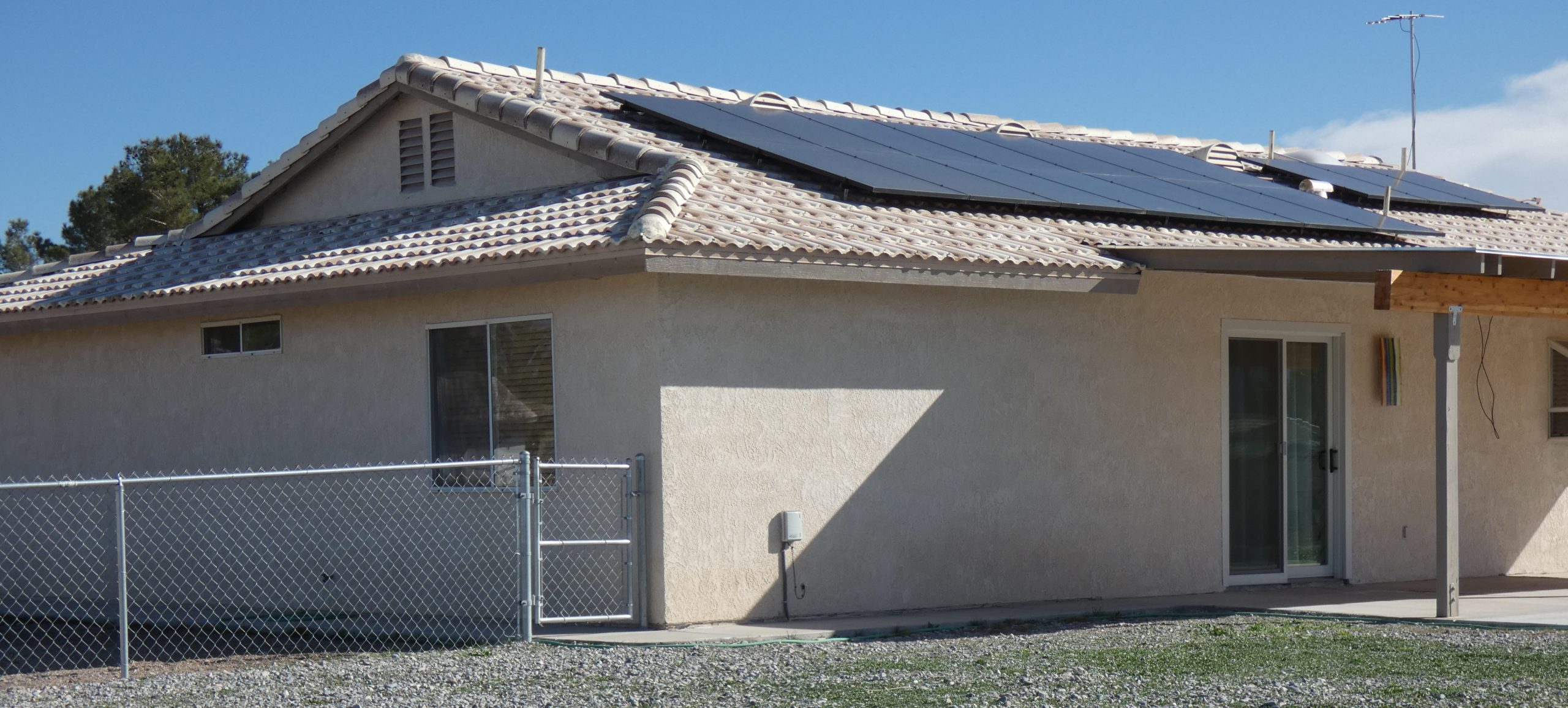 Newberry Solar back patio and side gate